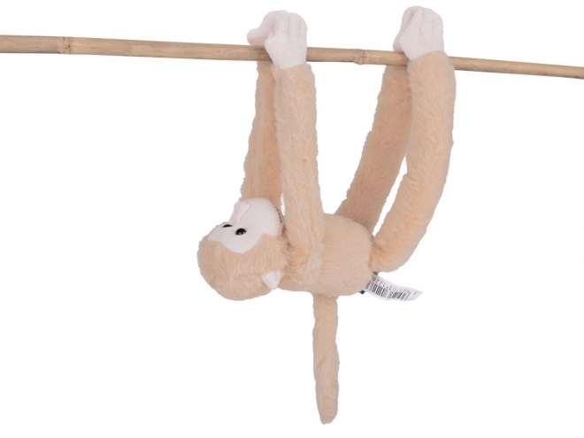 Hangende aap mascotte in beige kleur