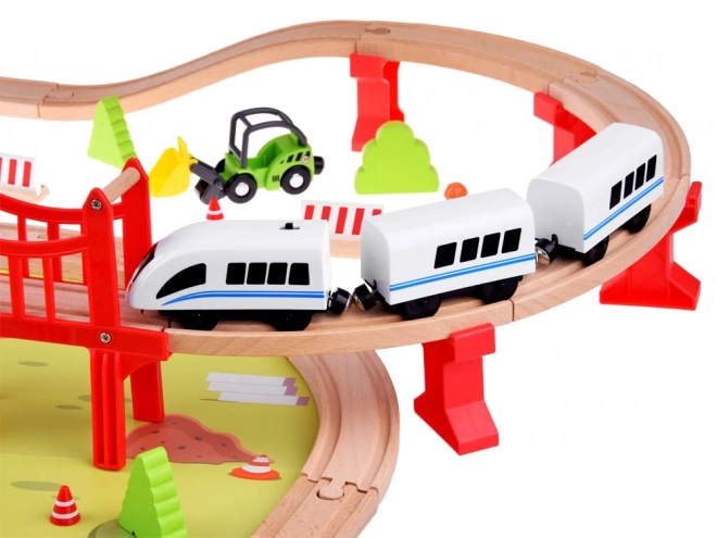 Houten spoorbaan voor kinderen met transportbasis en kraan
