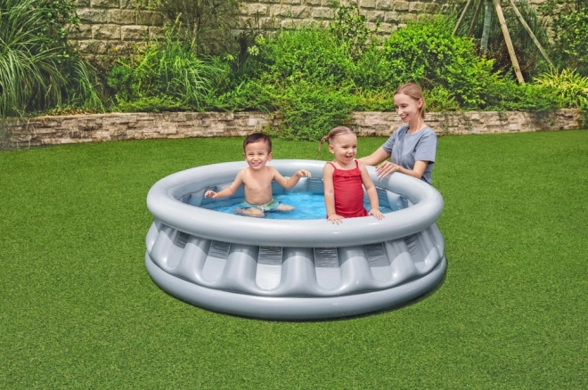 Opblaasbaar kinderzwembad ruimteschip 152x43cm in doos 30x30x7cm