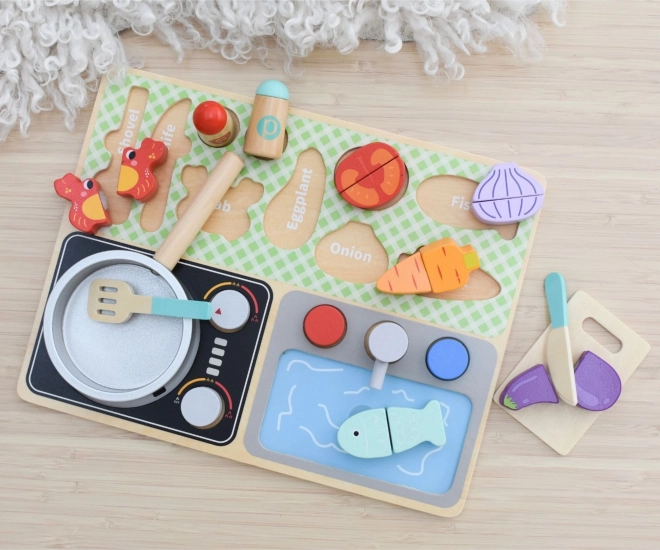 Houten keukentje met accessoires voor de kleine chef