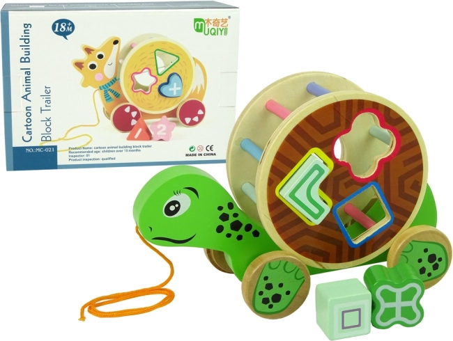 Houten trekschildpad met vormsorter en blokjes