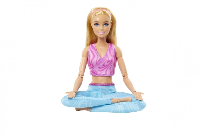 Barbie in beweging - Blondine met blauwe legging HRH27