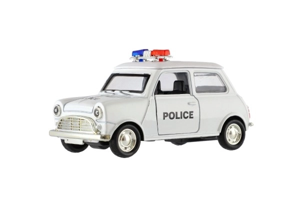 Retro politieauto 11cm metaal/plastic, zelfopwindend met licht op batterijen, 4 soorten
