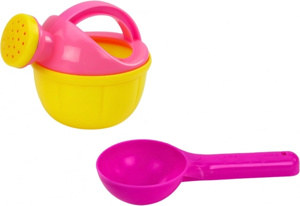 Gieter en schepje voor comfortabel spelen