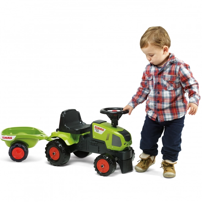 Loopauto - traktor Claas met stuur en aanhanger