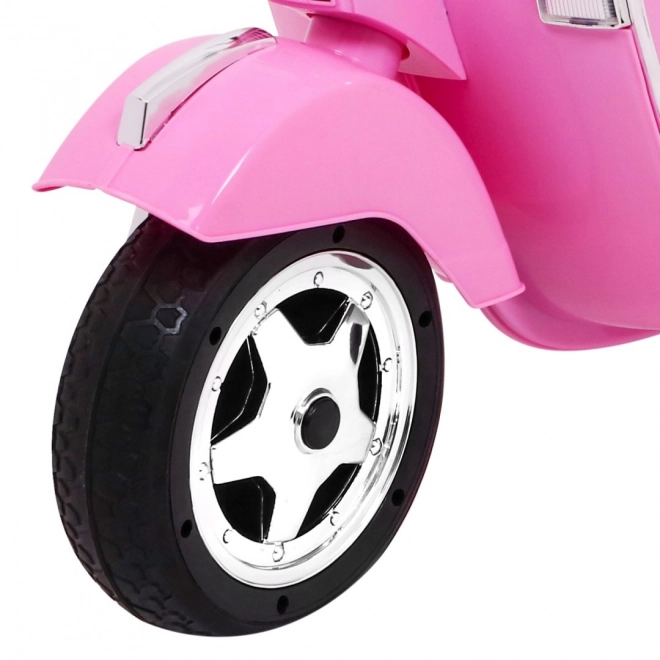 Elektrische kinderscooter Vespa roze met zijwieltjes