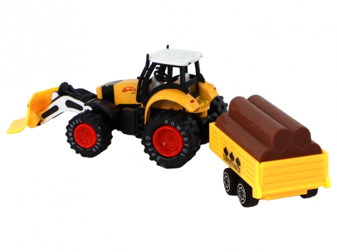 Tractor met aanhanger geel rood