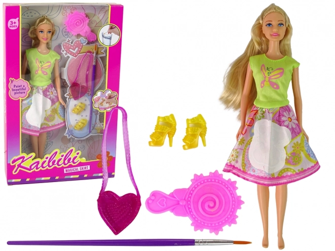 Lange haren schilderjurk pop – blondine