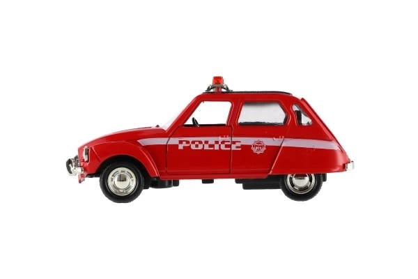 Retro politieauto 11cm metaal/plastic, zelfopwindend met licht op batterijen, 4 soorten