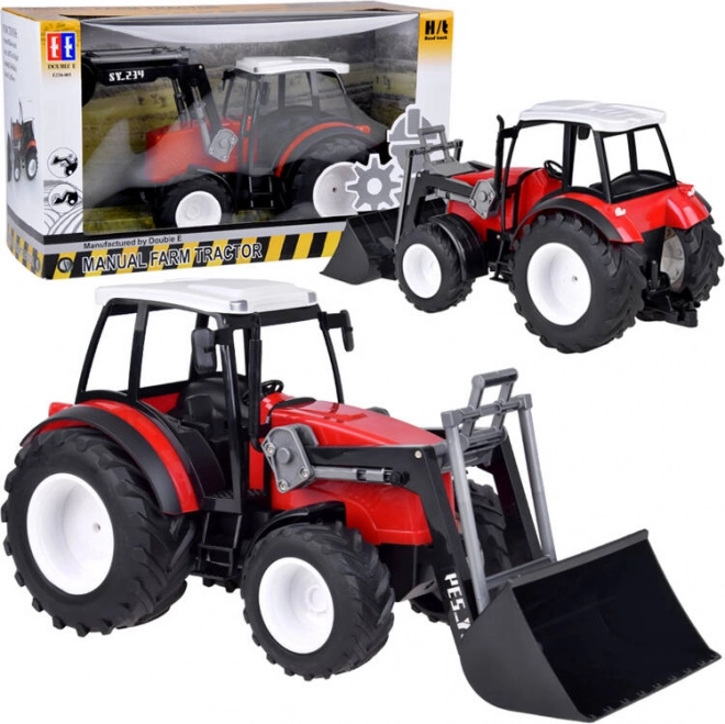 Grote rode tractor met beweegbare arm en grote wielen