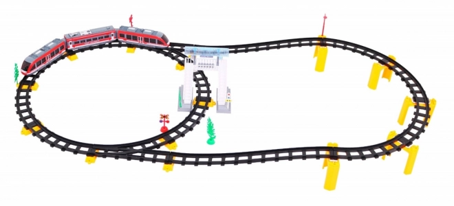 Afstandsbediende trein + hellingen + accessoires - 62 delen