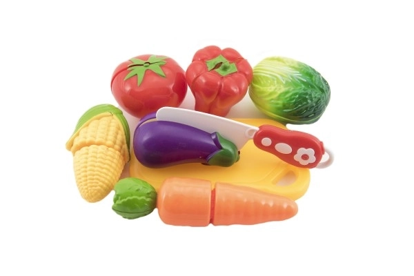 Snijgroente plastic met plank 13,5x8cm met mes in zak 18x26x5cm