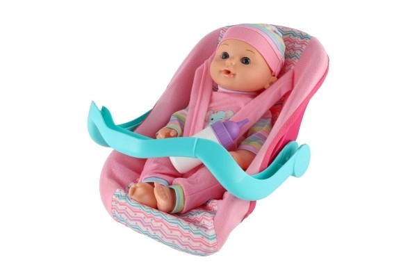 Poppen baby 30 cm plastic in draagzak/autostoeltje met flesje in blister
