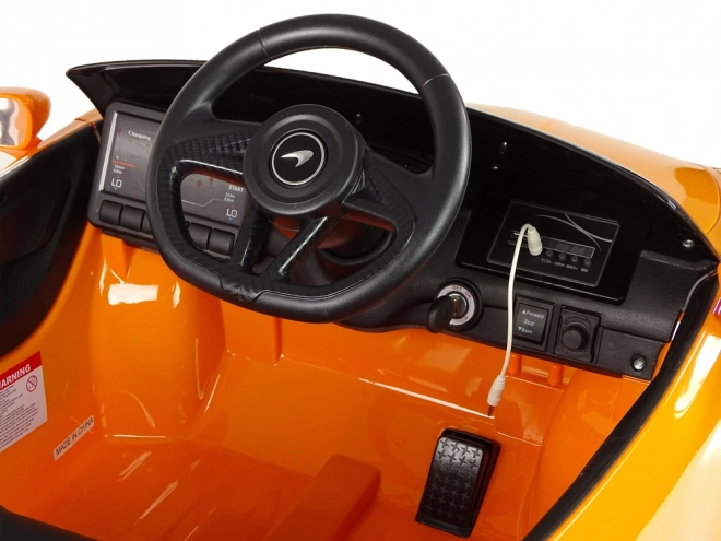 Kinderen batterijauto McLaren GT oranje