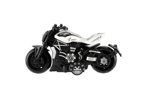 Motorfiets metaal/kunststof 10cm op terugtrekmechanisme mix kleuren