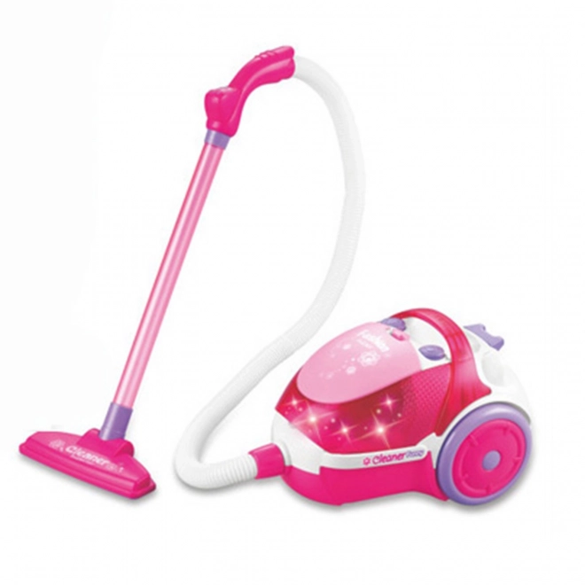 Roze kinderstofzuiger met zuigfunctie