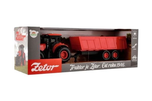 Rode Zetor tractor met aanhanger met geluidseffecten en lichteffecten - 36 cm