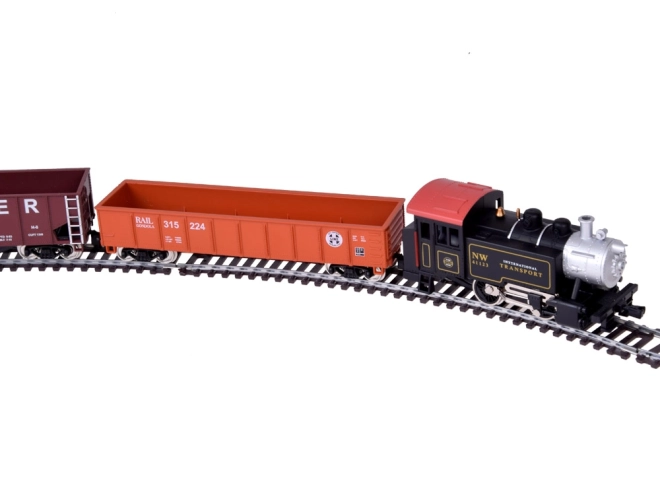 Elektrische treinstellen met klassieke stoomlocomotief en bedieningsunit