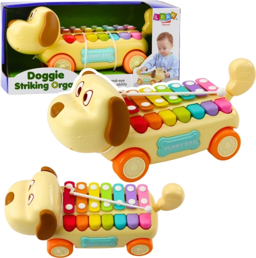 Rijdend hondje met cimbalen