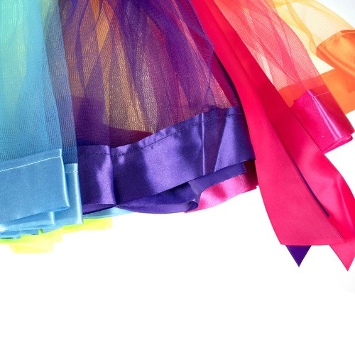 Eenhoorn kostuum met een regenboogrok en vleugels