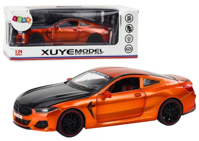 Metalen sportmodel met wrijvingsaandrijving en opengaande elementen 1:24 oranje