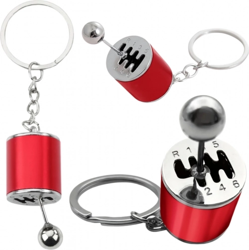 Metalen sleutelhanger in de vorm van een handgeschakelde versnellingsbak – rood