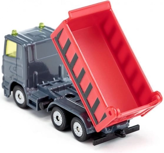 Twee kantelbare bakken met te openen kleppen