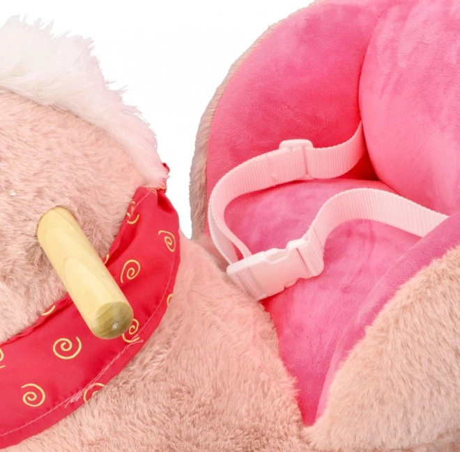 Roze eenhoorn met autostoel
