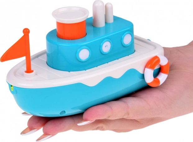 Zwevende kinderbadboot met fontein