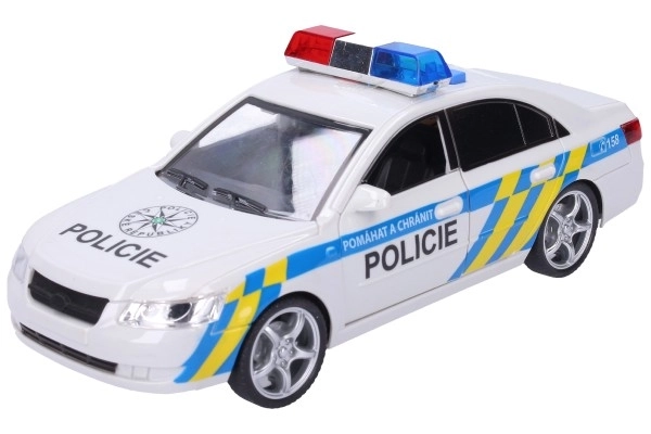 Plastic politieauto 24 cm op batterijen met geluid en licht in doos 28x14,5x12 cm