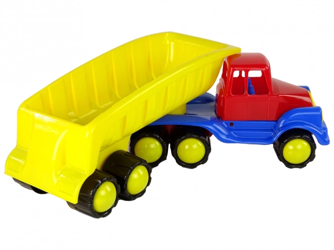 Grote gele vrachtwagen met aanhanger 45 cm