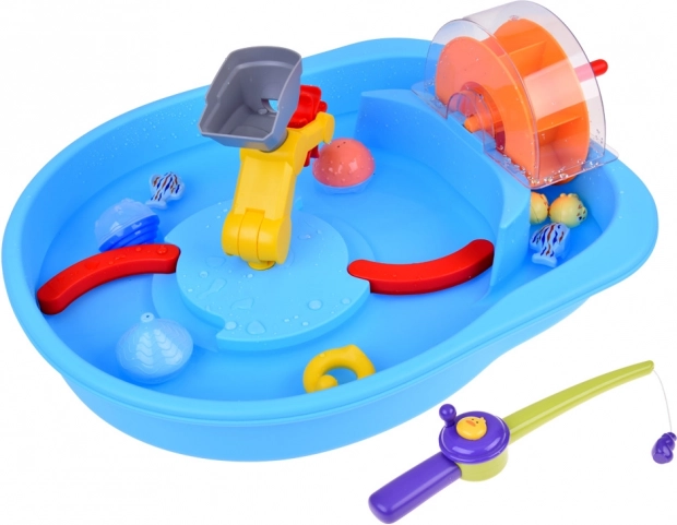 Blauwe watertafel met waterrad en visaccessoires