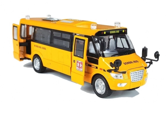 Metalen schoolbus met opwindmotor