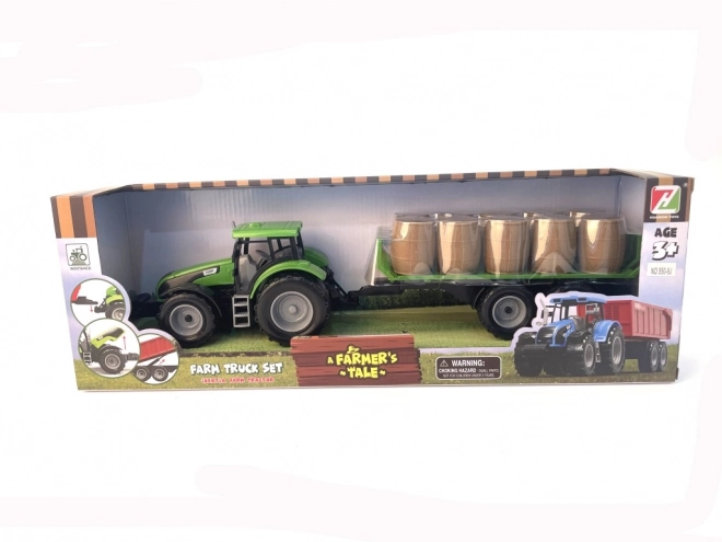 Tractor met vliegwiel en aanhanger vol hooi