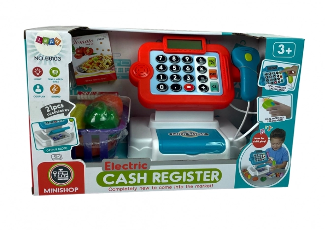 Kinderspeelkassa met rekenmachine en groentemand