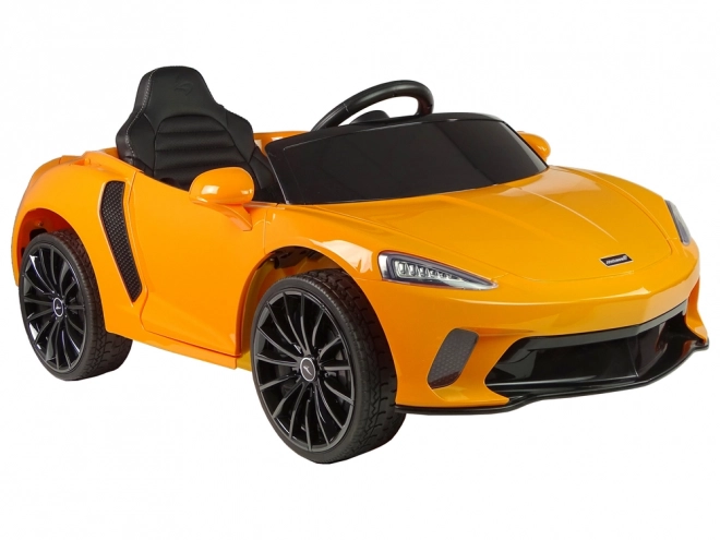Kinderen batterijauto McLaren GT oranje