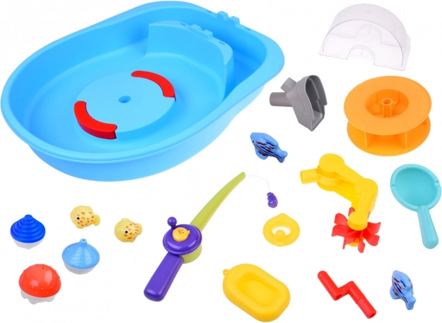 Blauwe watertafel met waterrad en visaccessoires