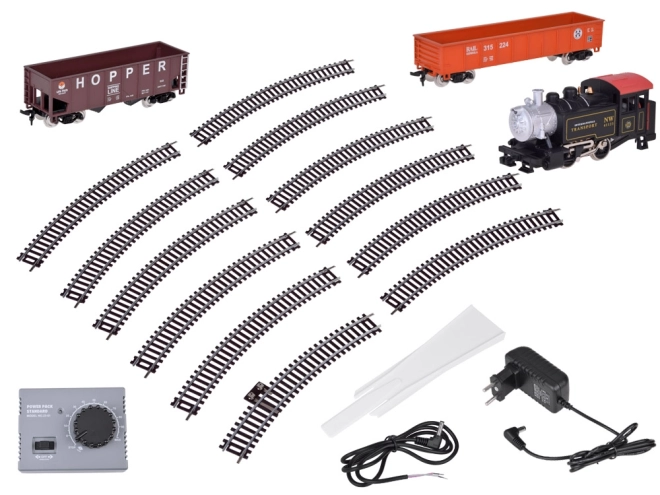 Elektrische treinstellen met klassieke stoomlocomotief en bedieningsunit