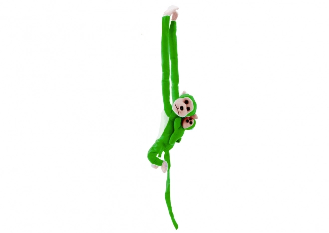Pluchen aap met groene jong