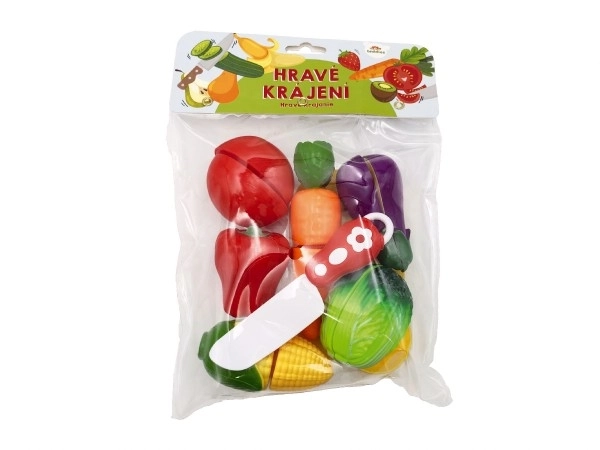 Snijgroente plastic met plank 13,5x8cm met mes in zak 18x26x5cm