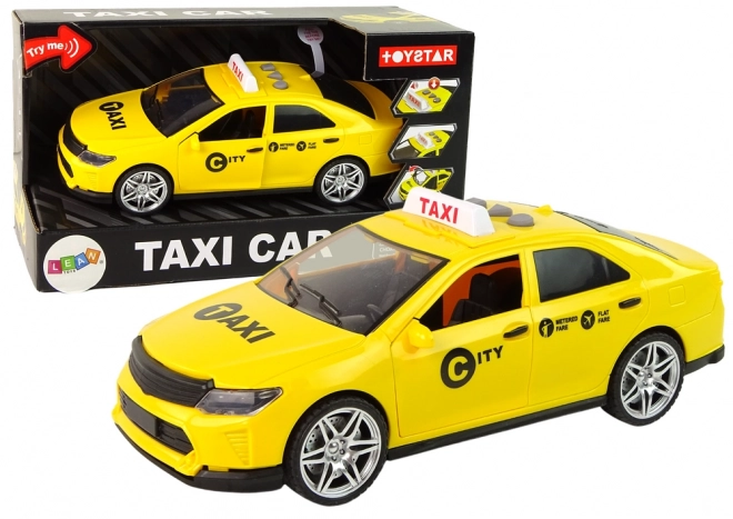 Taxi-auto 1:14 met licht en geluid – geel