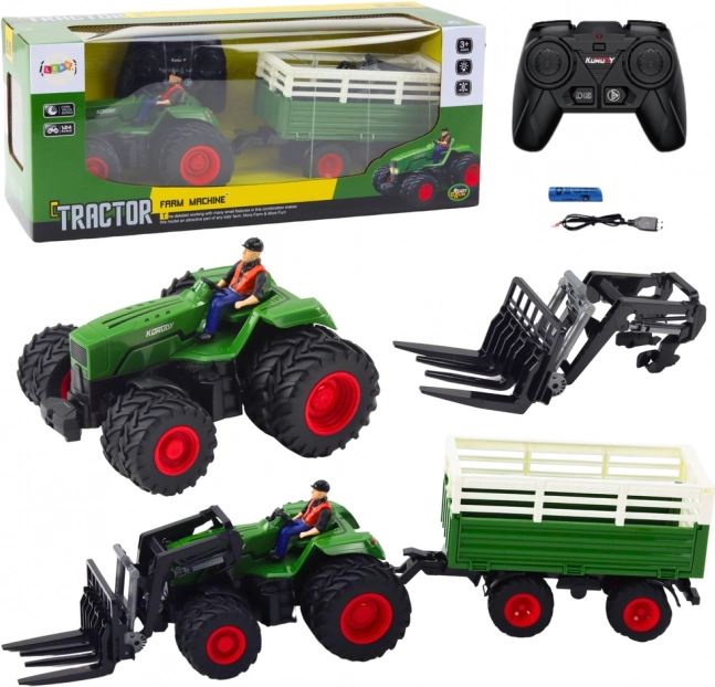 Afstandsbediende tractor met aanhanger en vorken