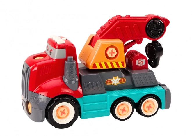 Vrachtwagen met Rode Kraan om te Bouwen