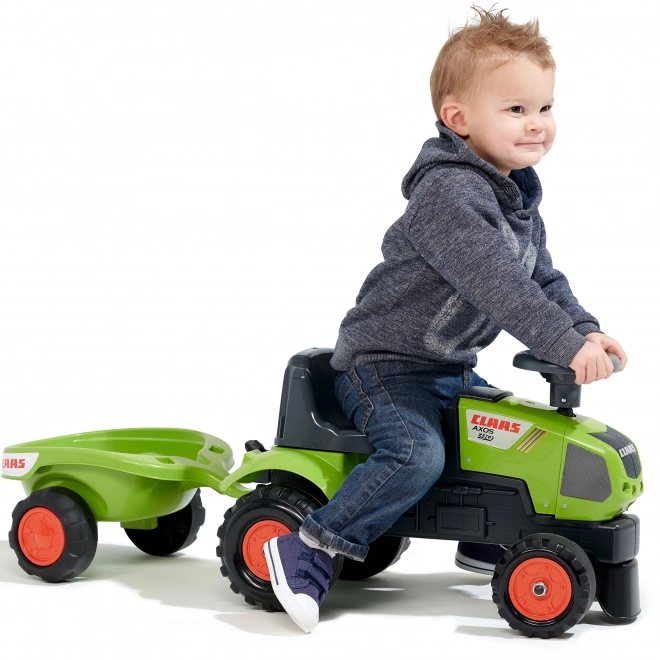 Loopauto - traktor Claas met stuur en aanhanger