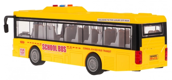 Gele bus met licht- en geluidsfunctie