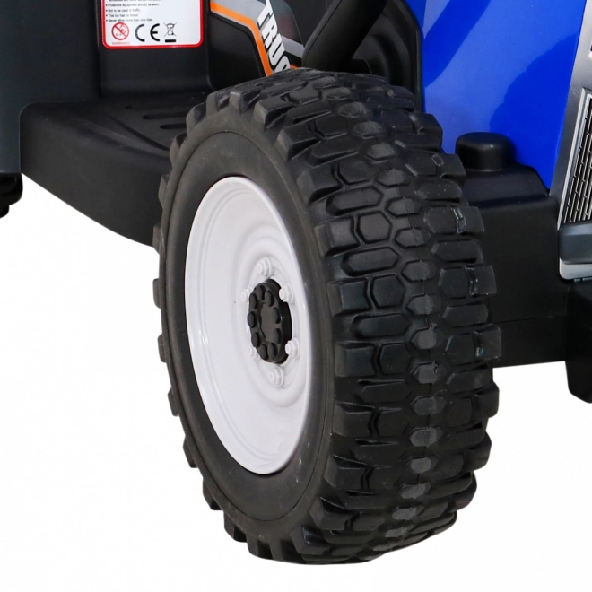 Kindertractor met aanhanger blauw