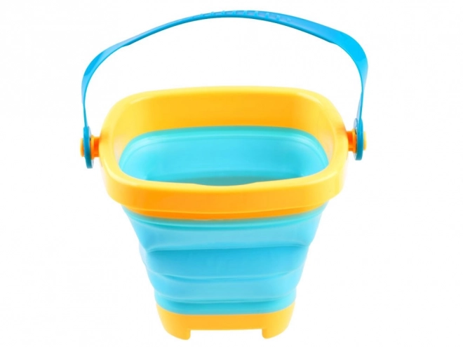 Set speelgoed voor zand met emmer en vormpjes