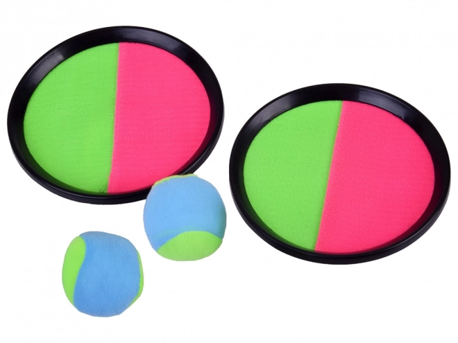 Spel met vangststokken en klittenbandballen