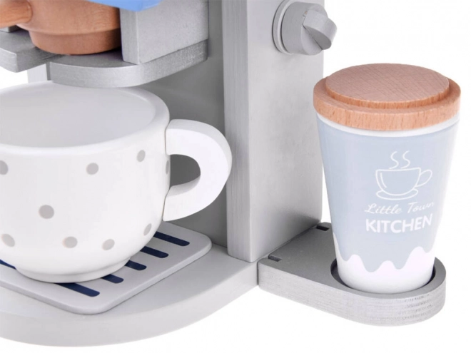 Houten blauwe koffiezetapparaat met kopje