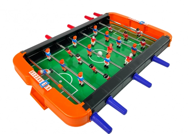 Tafelvoetbalspel – oranje tafelvoetbal